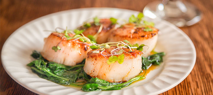 Coquilles met spinazie